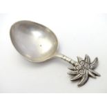 A novelty silver caddy spoon the handle decorated with palm tree and coconuts , marked Stg.Sil. 3"