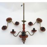 A red glass and gilt electrolier and two matching wall lights, the electrolier 21" long Please