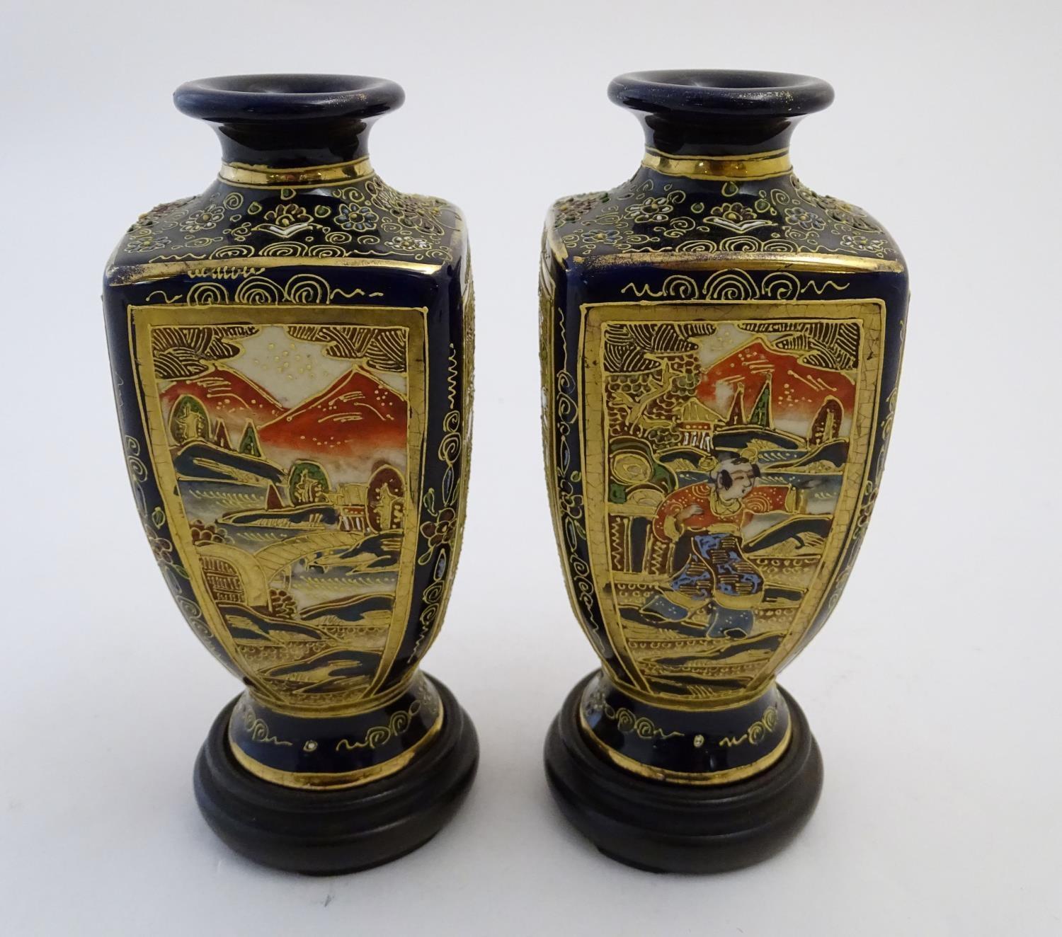 A pair of Japanese Satsuma vases of square baluster form with a cobalt blue ground, with panelled - Image 5 of 8