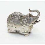 A white metal pill box formed as an elephant. Probably Indian 1 3/4" long Please Note - we do not