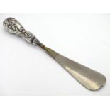 A silver handled button hook hallmarked Birmingham 1905. Approx 9" long overall Please Note - we