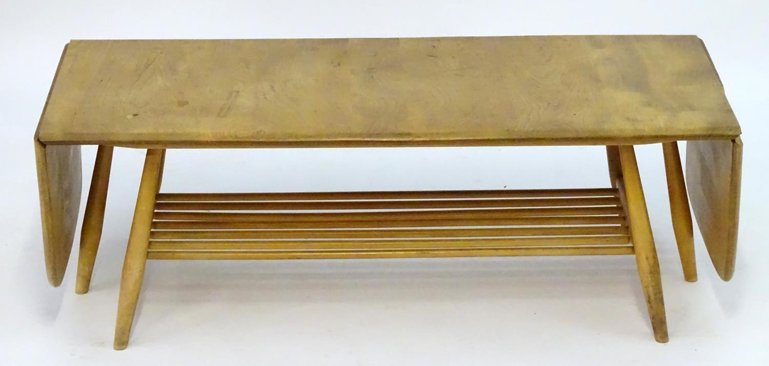 Vintage Retro, Mid-Century: an Ercol elm and beech coffee table, extending with drop flaps, standing - Image 3 of 7