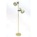 Vintage Retro, Mid-Century: a European standard lamp, in gilt finish with two uplights (adjustable