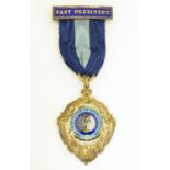 A Silver gilt and enamel medallion for 'Past President' of 'The Institution Of Metallurgists'.