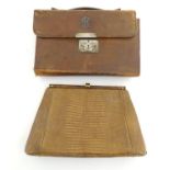 A late 19thC / early 20thC pig skin travelling vanity case of satchel form with blue leather lining,