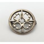 Orkney - Scotland : A Scottish silver brooch with Celtic decoration by Ola M Gorie. 3/4" diameter