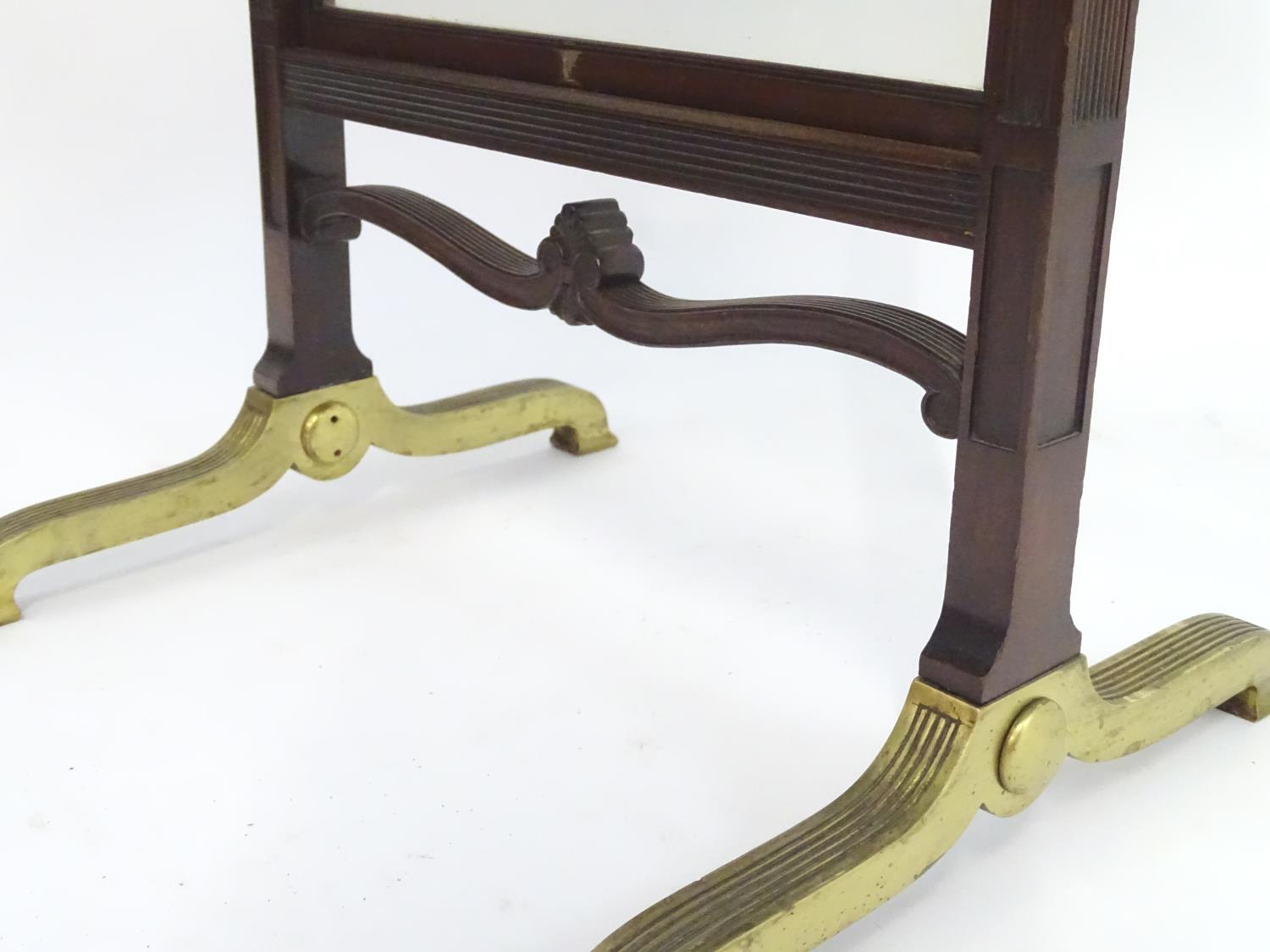 An unusual 19thC metamorphic reading table / fire screen. Having a sliding glass screen with a brass - Image 9 of 13
