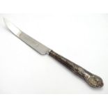 A silver handled grapefruit knife. Hallmarked Sheffield 1971 8" long overall Please Note - we do not