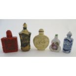 Five assorted 20thC Oriental snuff bottles of varying shapes and sizes. The tallest 3 1/2" high (