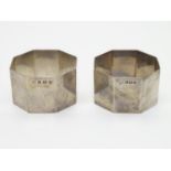 A pair of silver napkin rings of octagonal form. Hallmarked Birmingham 1954 maker Barker Brothers