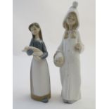 Two Lladro figures to include a girl holding a piglet Girl with Pig, model no. 1011, and Girl with