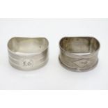 Two Art Deco silver D shaped napkin rings with engine turned decoration. Hallmarked Birmingham