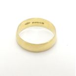 An 18ct gold ring. Ring size approx L ( 2.8g) Please Note - we do not make reference to the