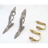 Two pairs of 20thC metal wall brackets, in silver and gilt finishes, the largest pair 15 3/4" Please