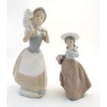 Two Nao figures to include Good Shepherdess, a girl with a lamb over her shoulders, model no. 238,