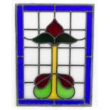 An Arts and Crafts stained glass window pane / panel, with stylised tulip flower detail. Approx.