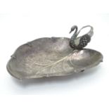 A Spanish silver plate dish of stylised leaf form with swan formed handle. Approx. 10" long x 3 1/2"