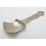 A Victorian silver shovel formed caddy spoon. Hallmarked Birmingham 1868 maker George Unite Approx 3
