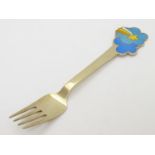 Scandinavian silver : A Danish sterling silver gilt and enamel 1975 Christmas fork with shooting