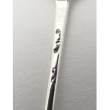 An 18th C Geo III silver mote spoon 5 3/8" long Please Note - we do not make reference to the