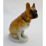 A Russian Lomonosov figure of a seated Mastiff dog on an oval base. Marked Made in USSR with maker's