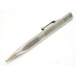 A silver Art Deco propelling pencil with engine turned decoration. Birmingham 1933 maker William