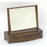 A 19thC mahogany dressing table mirror with a rectangular frame, decorative stringing and three