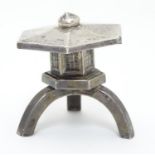 An unusual novelty pepper formed as a Japanese pagoda style building. Marked under Sterling 2"