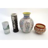 Four assorted vases, comprising A New Mexico Navajo studio pottery squat vase with incised banded