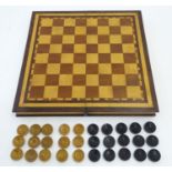 A late 19th / early 20thC folding games box with inlaid chess / draughts board exterior and inlaid