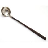 A Geo III Scottish silver ladle. 8 1/2" long overall Please Note - we do not make reference to the