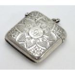 A silver vesta case with engraved decoration hallmarked Chester 1905 maker J & R Griffin (Joseph &
