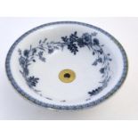 A Victorian Villeroy and Boch blue and white circular sink in the pattern Cyanus with floral and