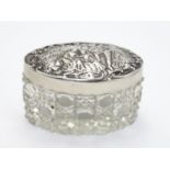 A cut glass dressing table pot with silver top hallmarked Birmingham 1901 maker Levi & Salaman. 3" x