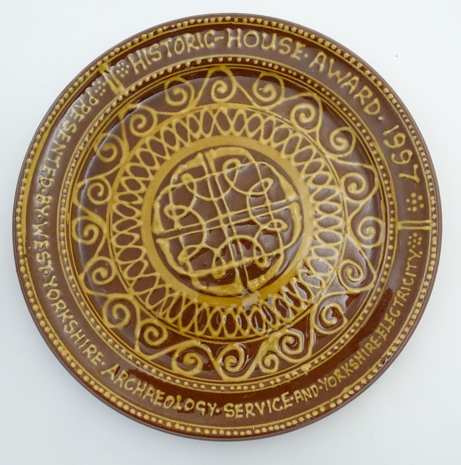 Four 20thC slipware chargers decorated with abstract patterns, one with a border bearing Historic - Image 3 of 8