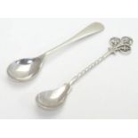 Two silver mustard spoons, one with unusual handle surmounted by openwork quatrefoil detail