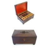 A 19thC mahogany veneered work box of sarcophagus form with fitted tray and compartments to