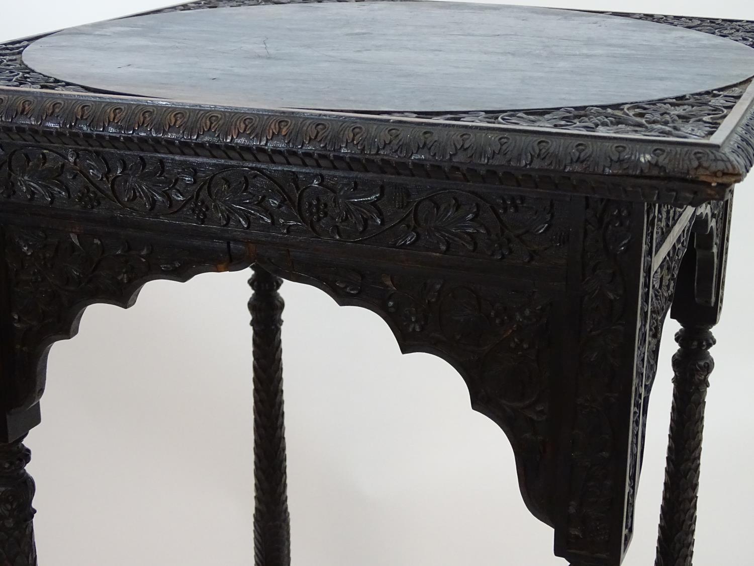 A 19thC rosewood mirror with a pierced and carved top and bottom, depicting anthemion in flower - Image 7 of 8