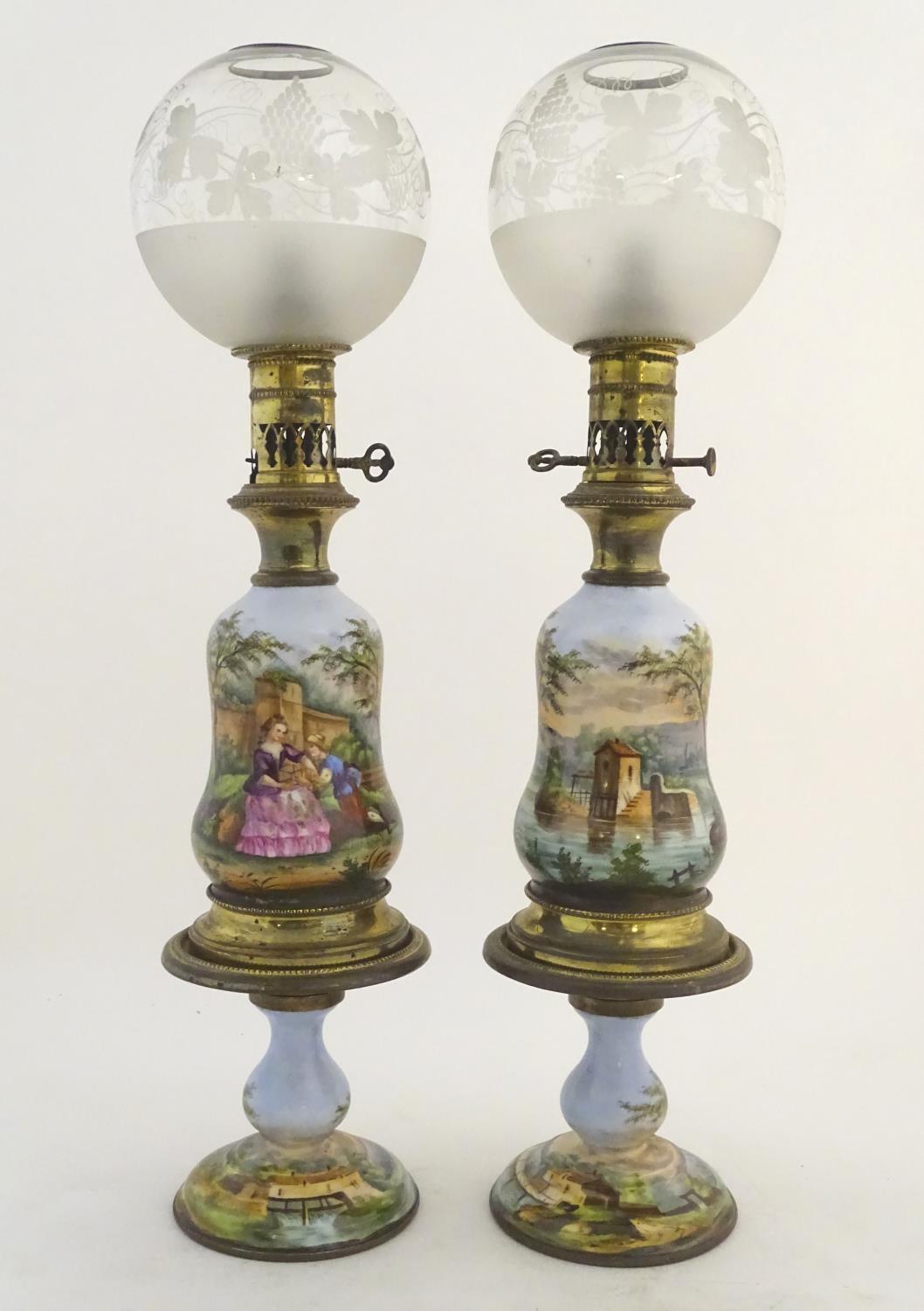 A pair of 19thC oil table lamps, of brass construction with separable bases, etched spherical