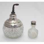 A Sterling silver mounted cut glass atomiser / scent bottle, the hobnail cut glass body with star