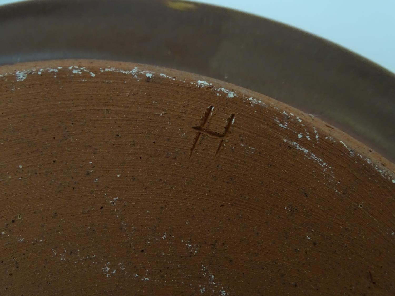 Four 20thC slipware chargers decorated with abstract patterns, one with a border bearing Historic - Image 8 of 8