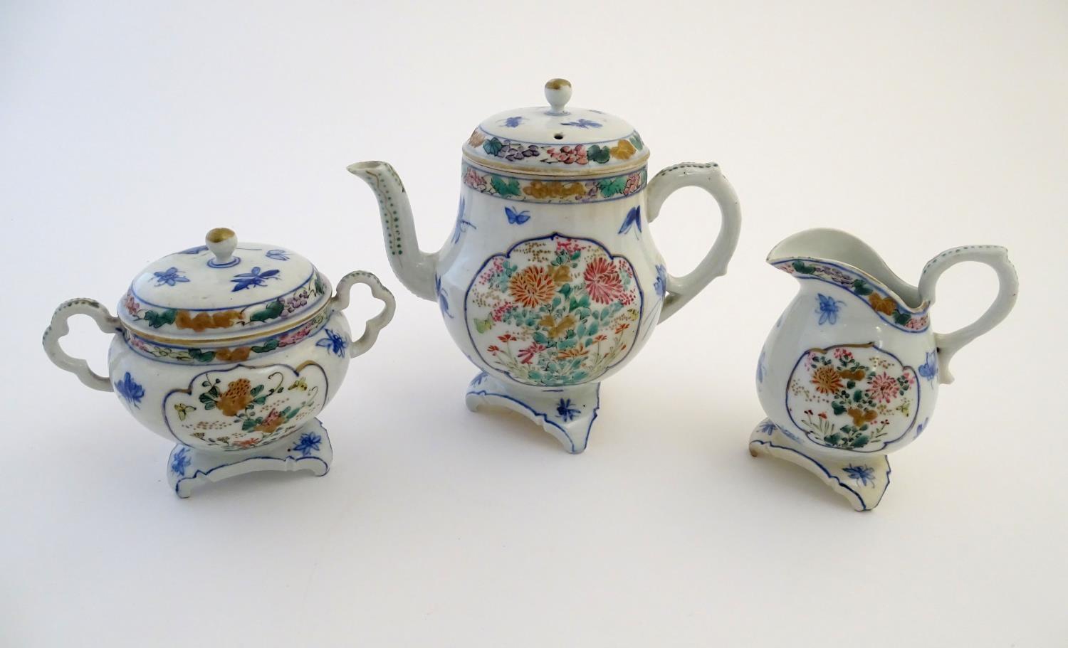 A Japanese teapot, twin handled sugar bowl and milk jug decorated with hand painted insects and - Image 3 of 8