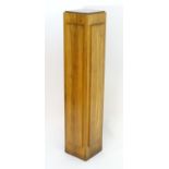 A tall Walnut Art Deco pedestal. Measuring 10 1/2" wide x 10 1/2" deep x 54" high. Please Note -