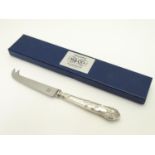 A silver handled King?s Pattern cheese knife. Hallmarked Birmingham 1993 maker WI Broadway & Co.