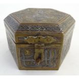 A Persian cedar lined table spice box of hexagonal form, with inlaid white metal and copper