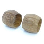 Two 20thC Robert Thompson Mouseman of Kilburn napkin rings with octagonal sides and carved mouse