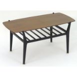 Vintage Retro, Mid-Century: a coffee table by Nathan Furniture, the teak top supported by a black