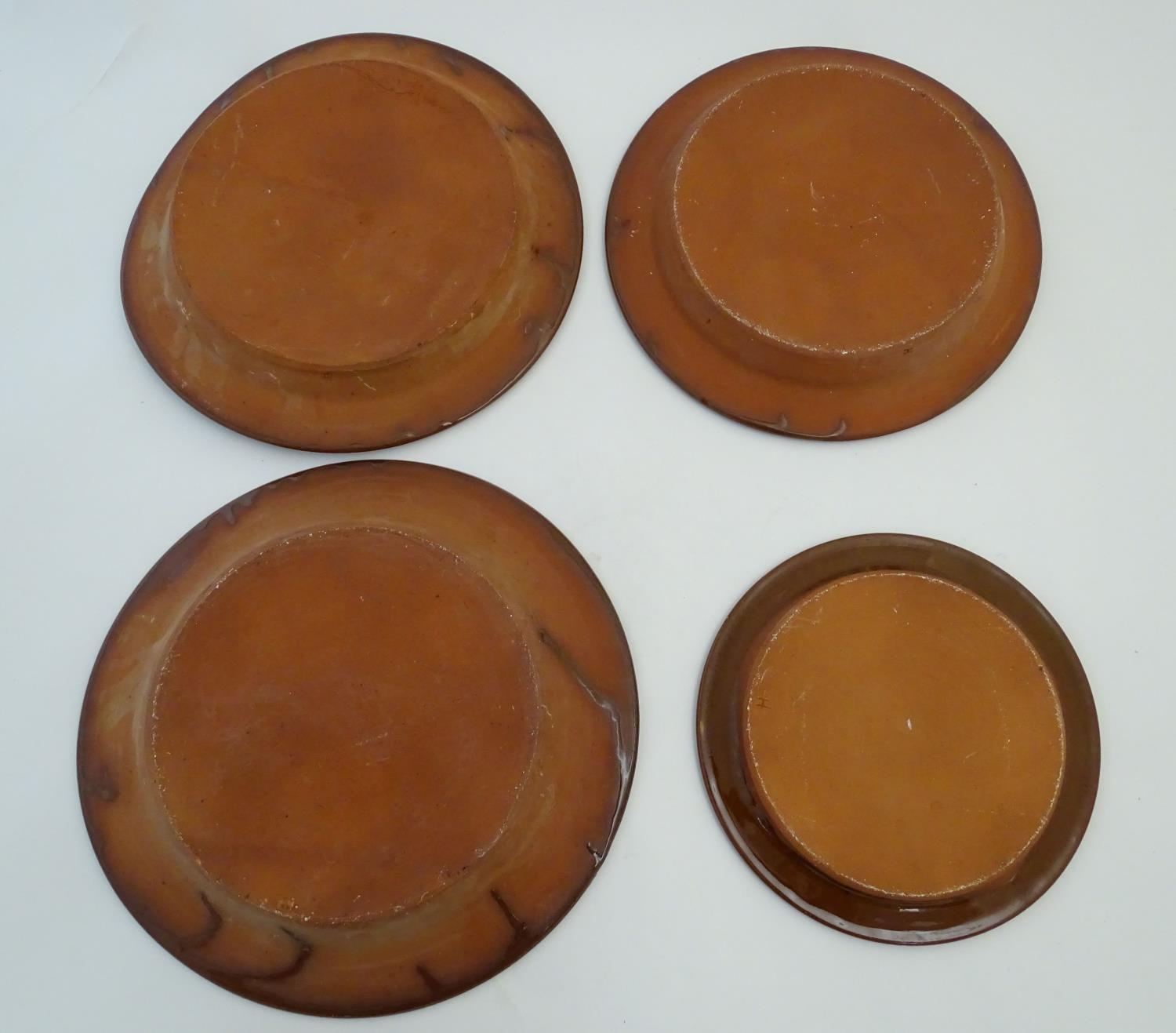 Four 20thC slipware chargers decorated with abstract patterns, one with a border bearing Historic - Image 7 of 8