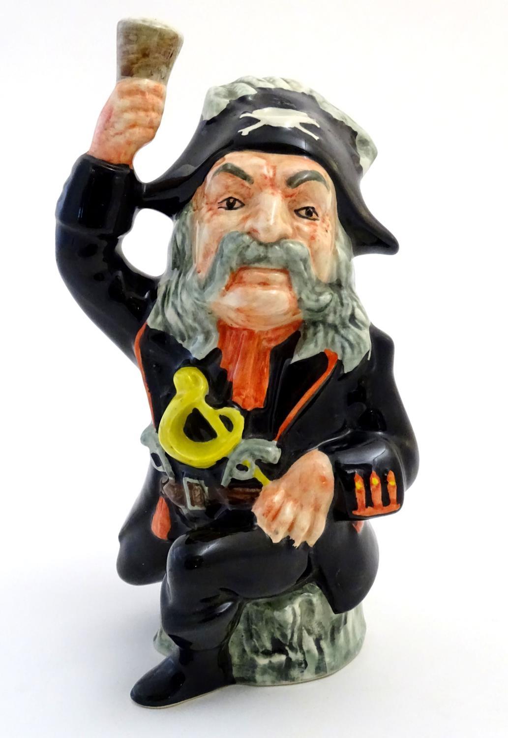 A large character figure depicting the Pirate King from the Gilbert & Sullivan comic opera The