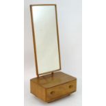 Vintage Retro, Mid-Century: an Ercol elm and beech cheval mirror, the adjustable back stand